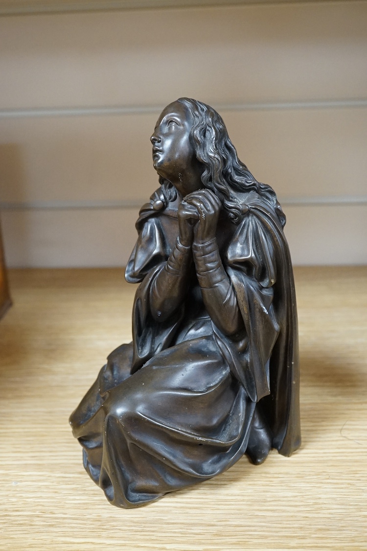 An early to mid 20th century bronze figure of Mary Magdalene kneeling, 20cm. Condition - good
